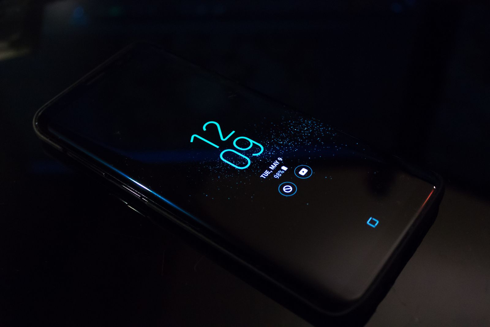 Smartphone on a dark surface representing wireless retail operations